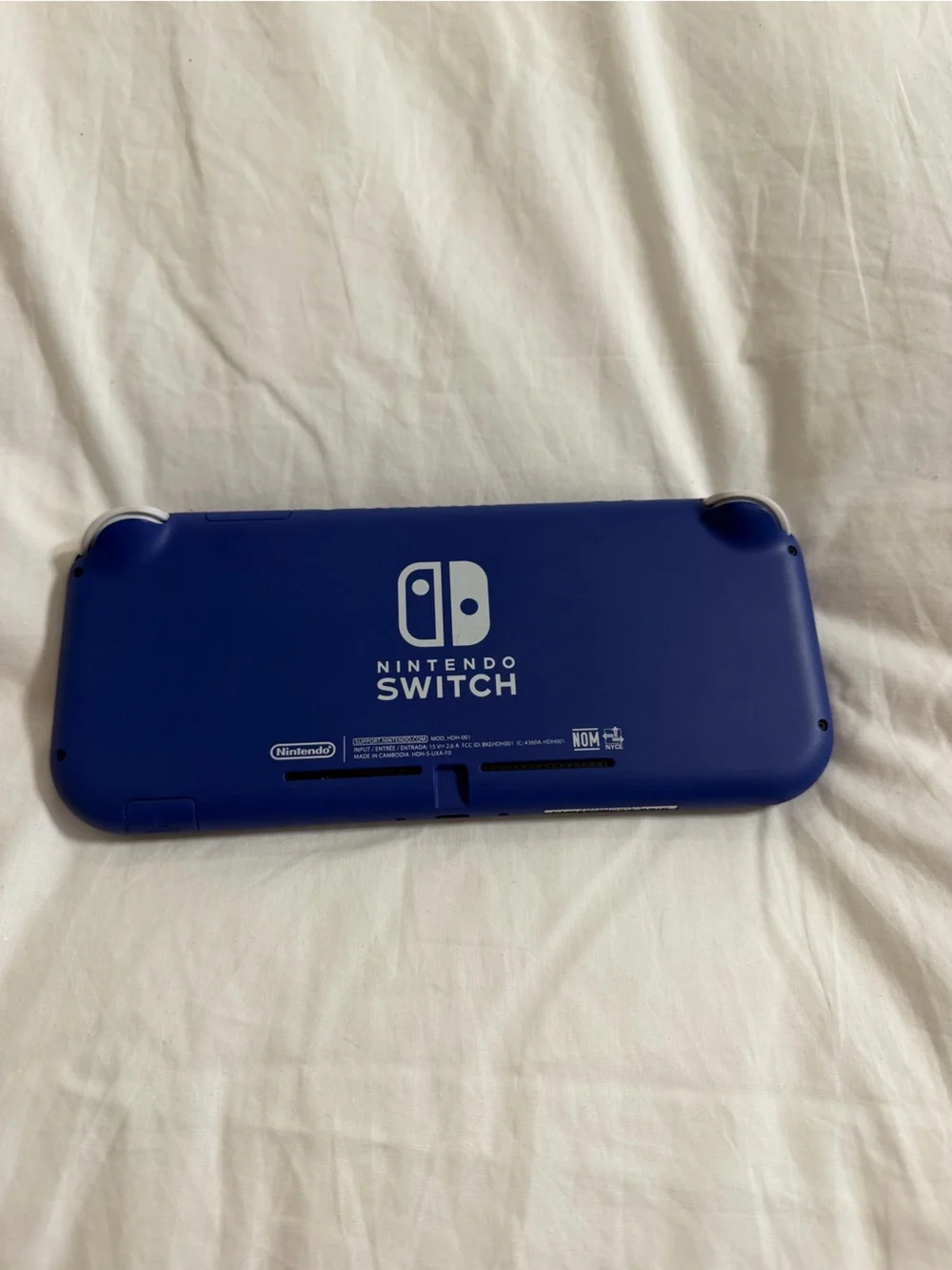 Nintendo Switch Lite Blue Handheld Console with White Buttons